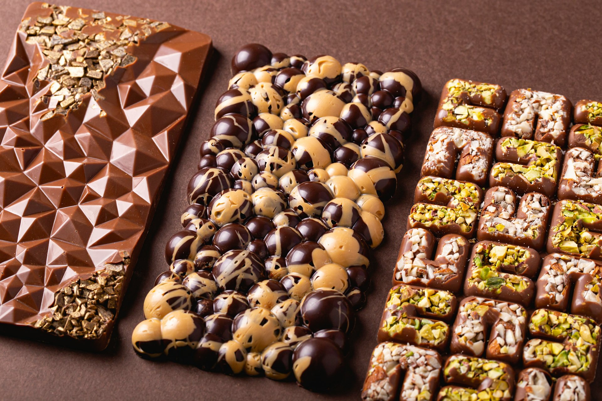 a table topped with chocolates covered in toppings